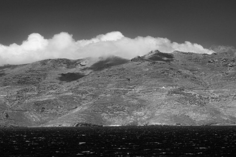 Aegean Sea adjoining hills and clouds