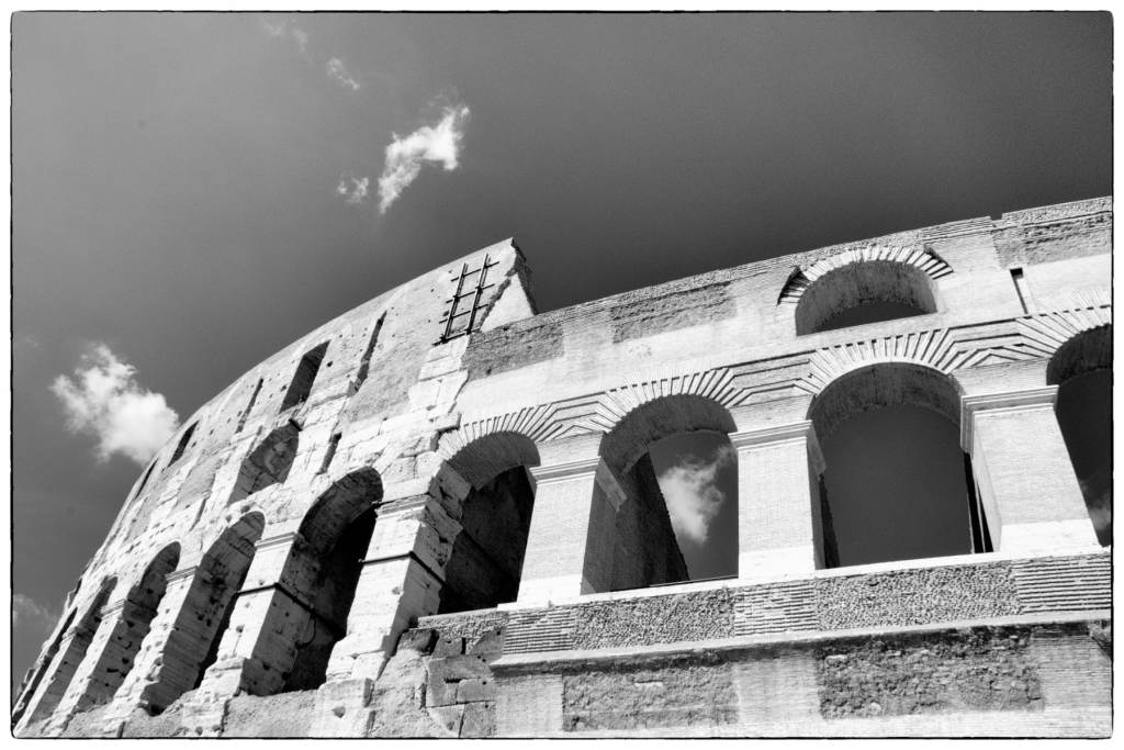 Colosseum with disappearing clouds