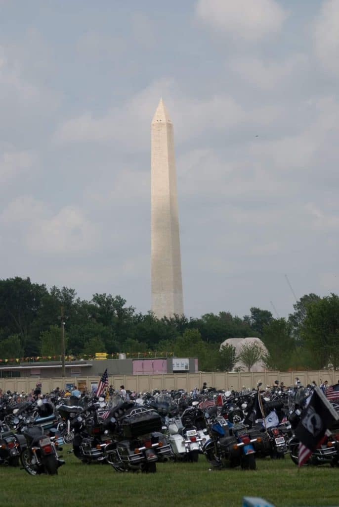 Steel and Flags in the Shadow of the Monument